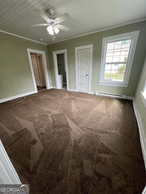 103 Grady Street Thomson, GA 30824 - Photo 9 of 27 a view of an empty room with a window