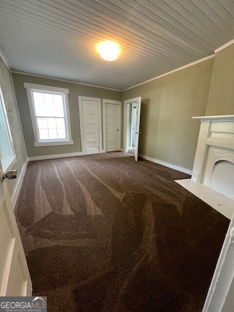 103 Grady Street Thomson, GA 30824 - Photo 10 of 27 a view of empty room with wooden floor and fan