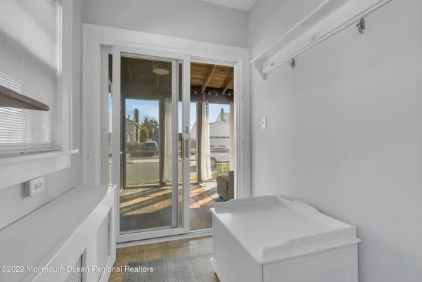 a bathroom with a tub and shower