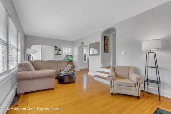 a living room with furniture and a couch