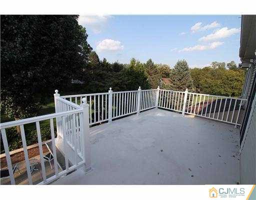 715 Old Raritan Road Edison, NJ 08820 - Photo 17 of 22 a view of balcony with furniture