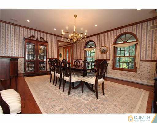 715 Old Raritan Road Edison, NJ 08820 - Photo 5 of 22 a view of a a dining room with furniture window and wooden floor
