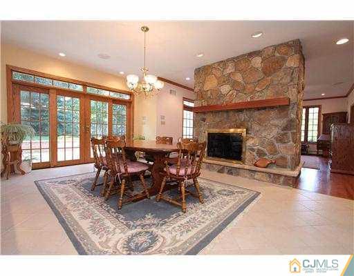 715 Old Raritan Road Edison, NJ 08820 - Photo 8 of 22 a dining room with furniture window and wooden floor