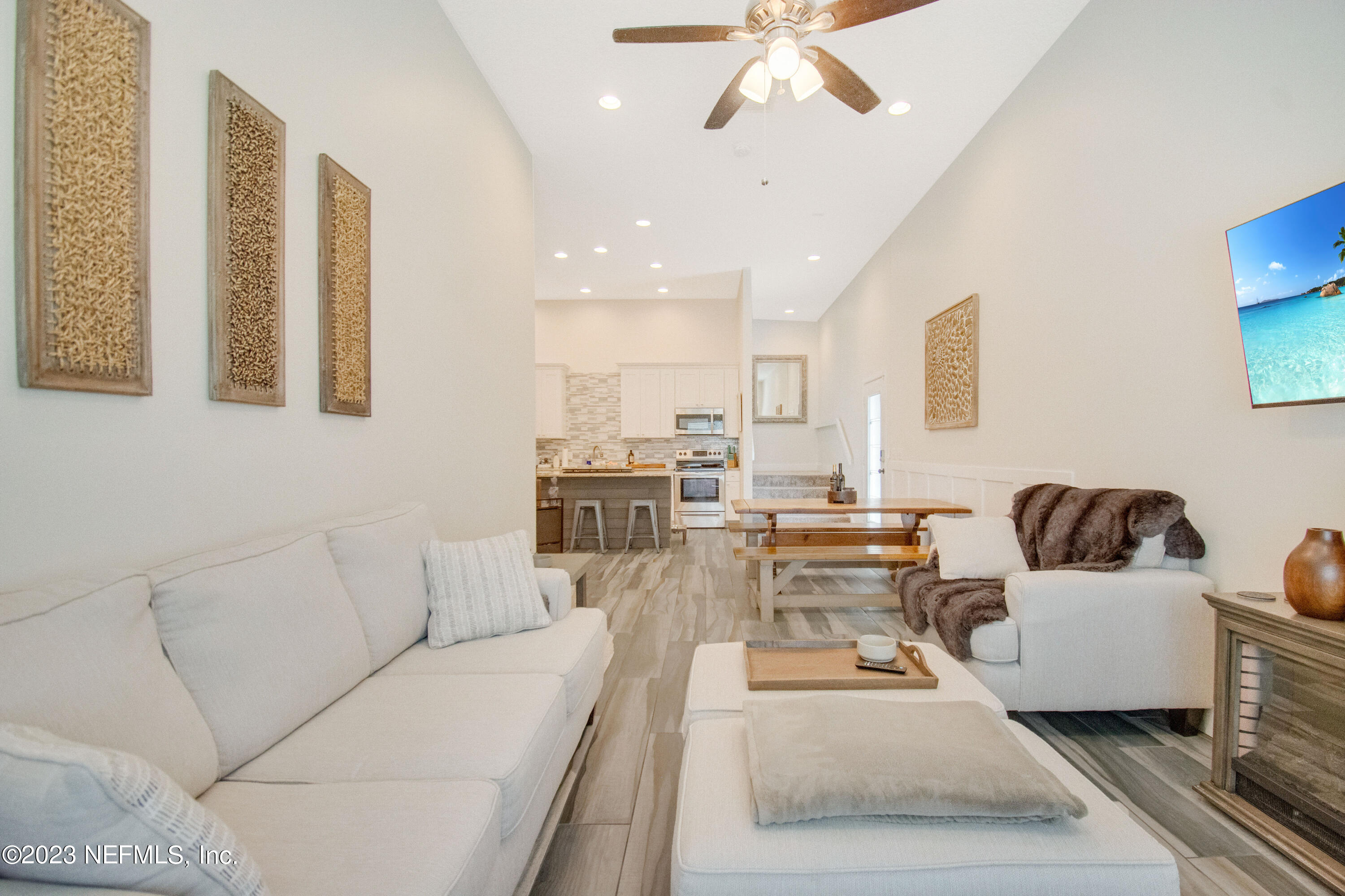 5378 A1A South St. Augustine, FL 32080 - Photo 11 of 34 a living room with furniture and a view of kitchen