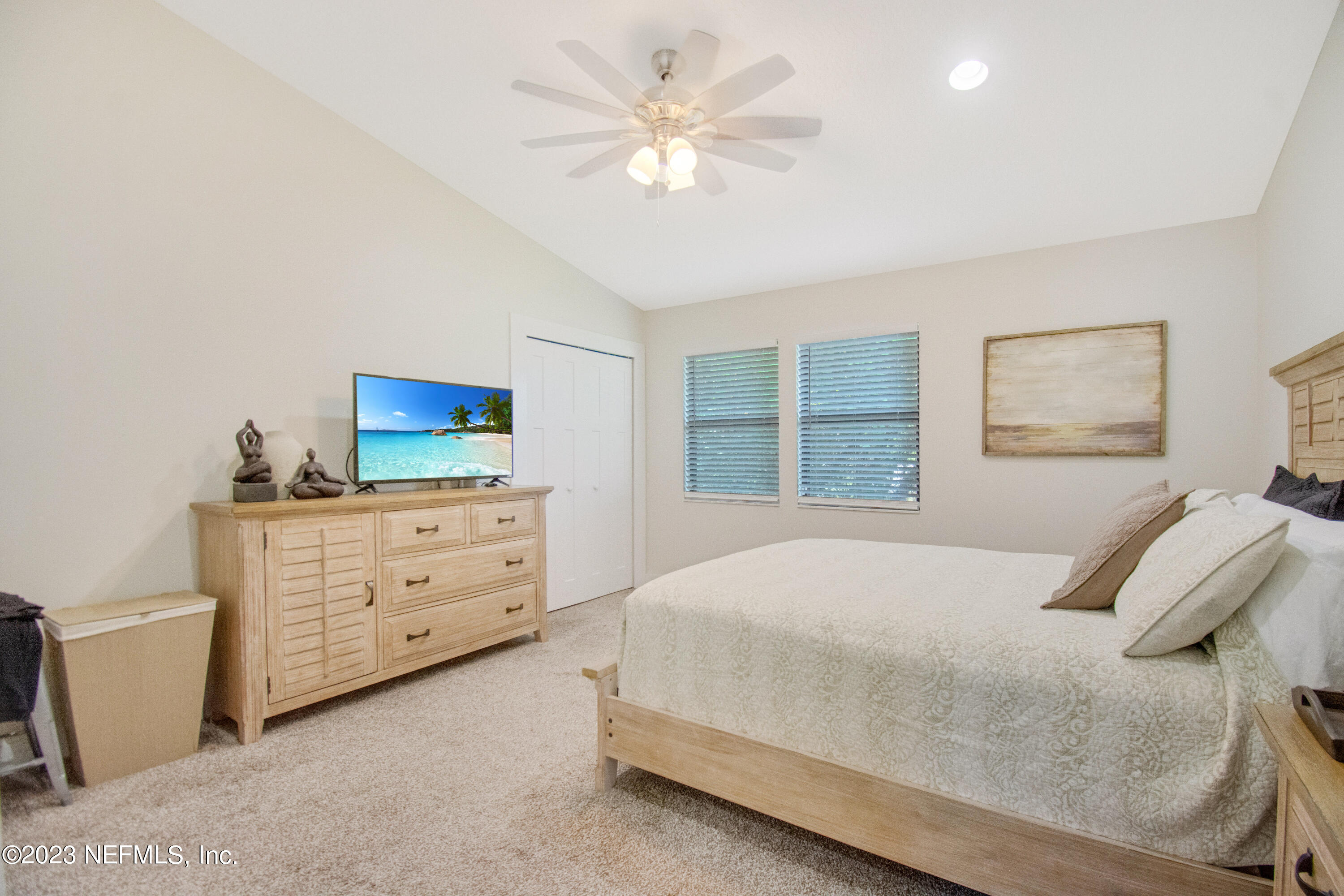 5378 A1A South St. Augustine, FL 32080 - Photo 15 of 34 a bedroom with a bed and a dresser
