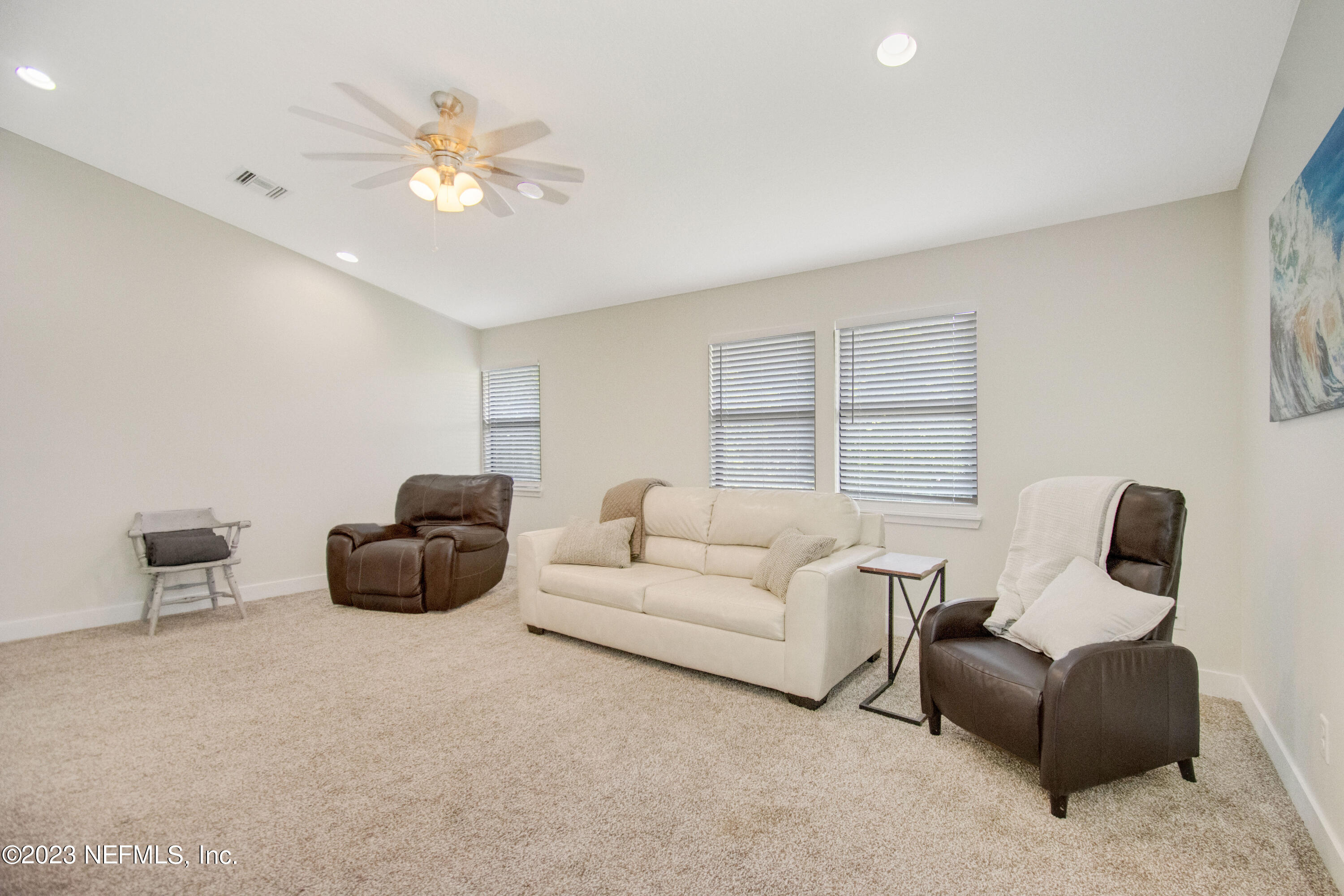 5378 A1A South St. Augustine, FL 32080 - Photo 20 of 34 a living room with furniture and a large window