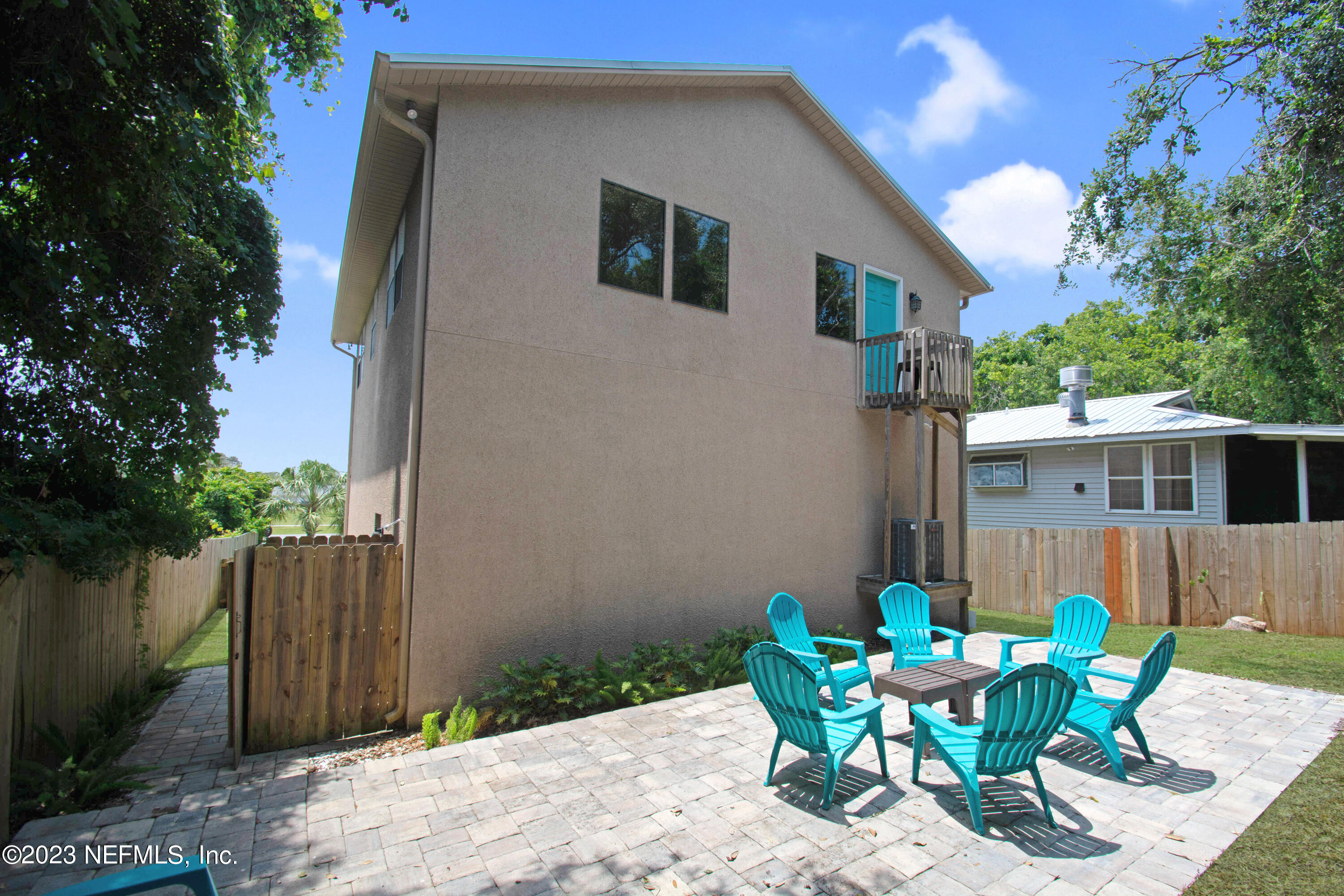 5378 A1A South St. Augustine, FL 32080 - Photo 31 of 34 a backyard of a house with table and chairs