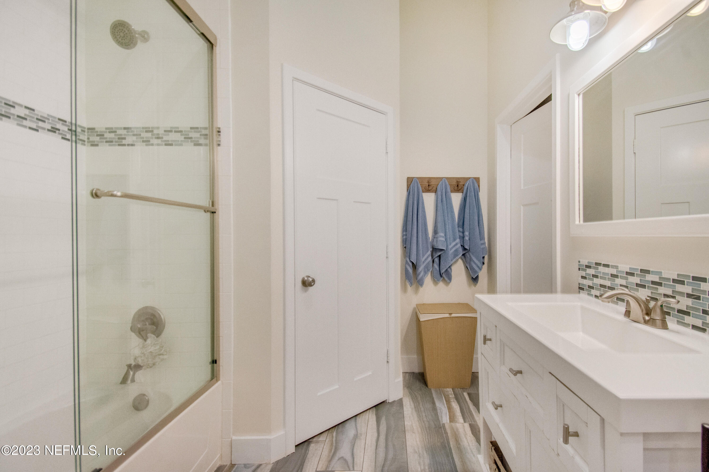 5378 A1A South St. Augustine, FL 32080 - Photo 8 of 34 a bathroom with a bathtub sink and mirror