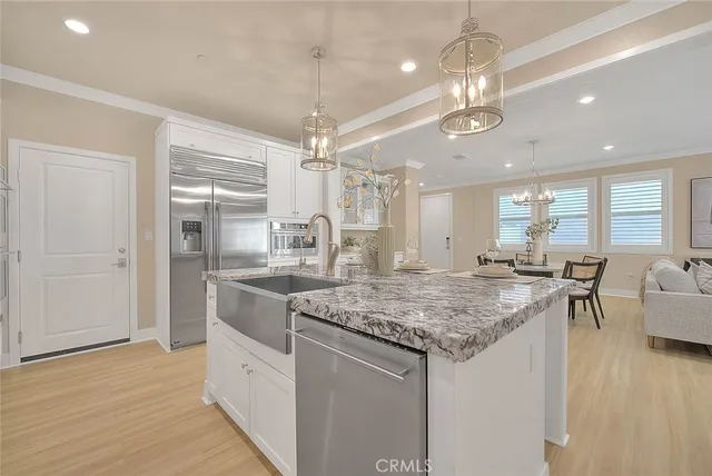 a bathroom with a sink mirror vanity and toilet