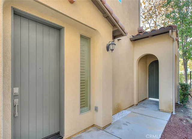 a view of a back yard from a hallway
