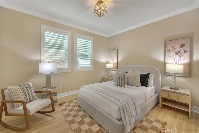 a bedroom with a large bed and a couch