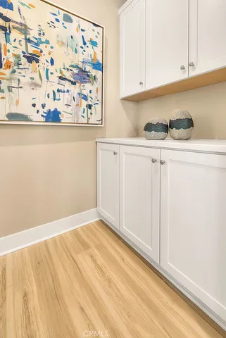 a bedroom with a bed and furniture