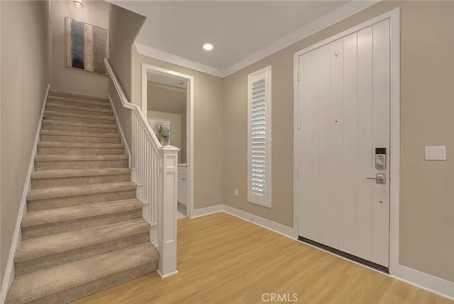 a spacious bathroom with a granite countertop sink a mirror and a bathtub