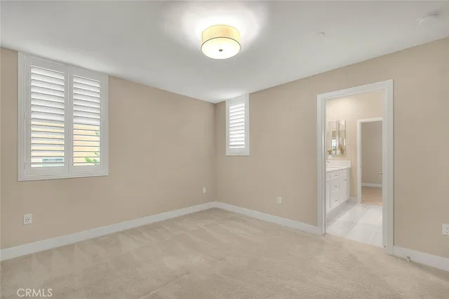 a bathroom with a sink toilet and vanity