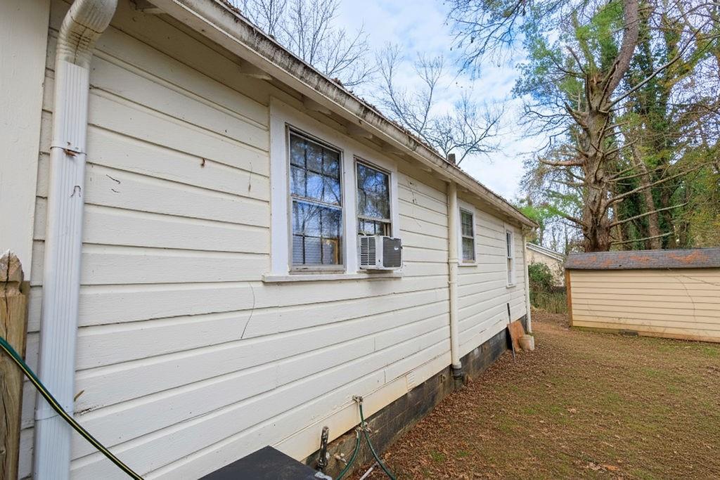 241 East Killian Street Canton, GA 30114 - Photo 3 of 15 a view of a house with a yard
