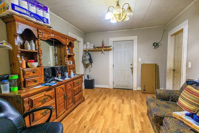 a bedroom with bed and window