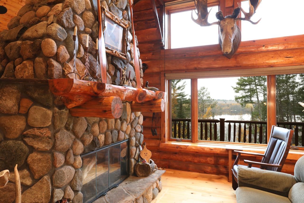 7236 Far North Road Orr, MN 55771 - Photo 4 of 42 Sunroom / solarium featuring a water view