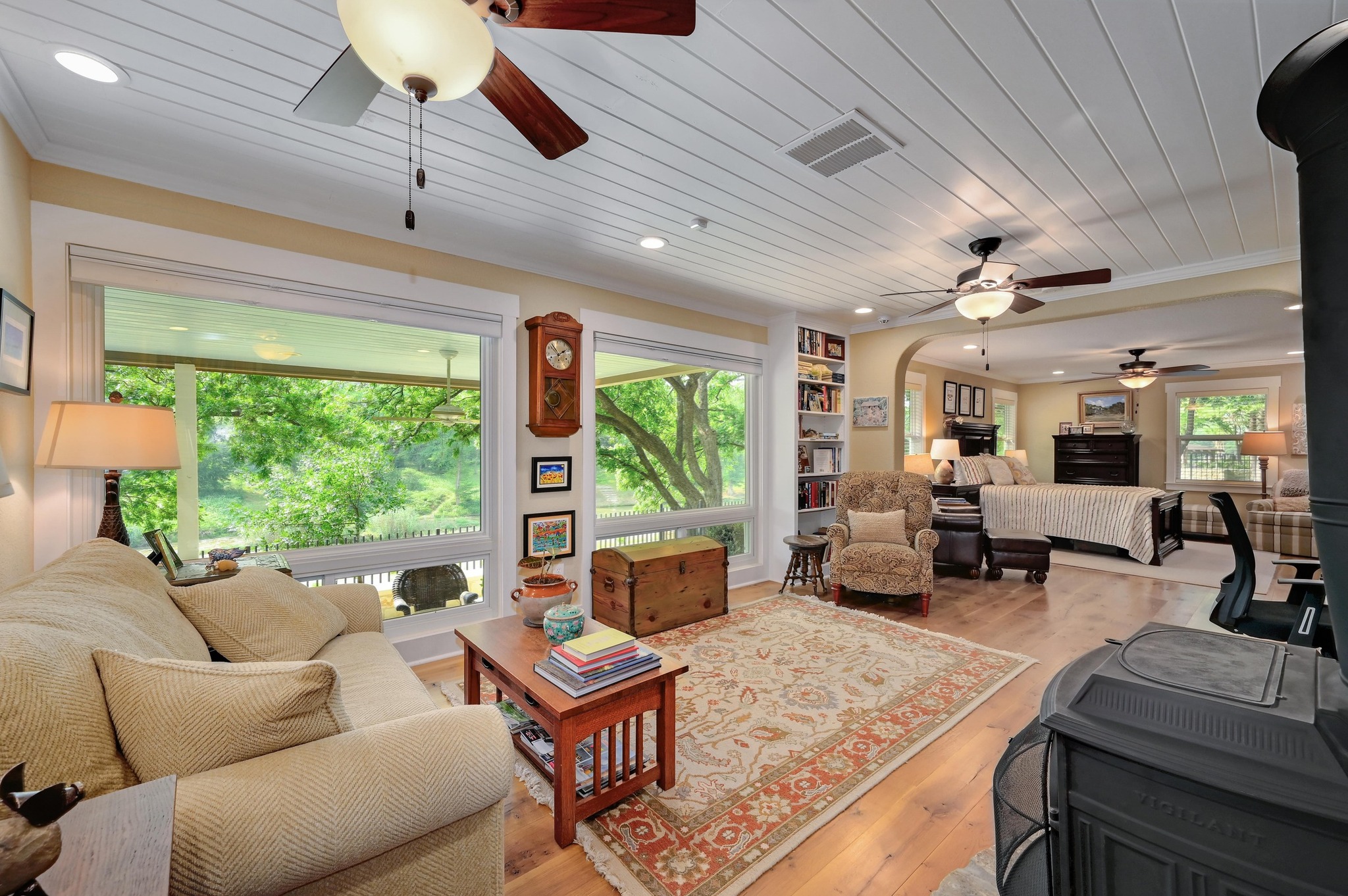 1020 River Road Wimberley, TX 78676 - Photo 1 of 1 Sitting room of the primary bedroom that features built in bookshelves.