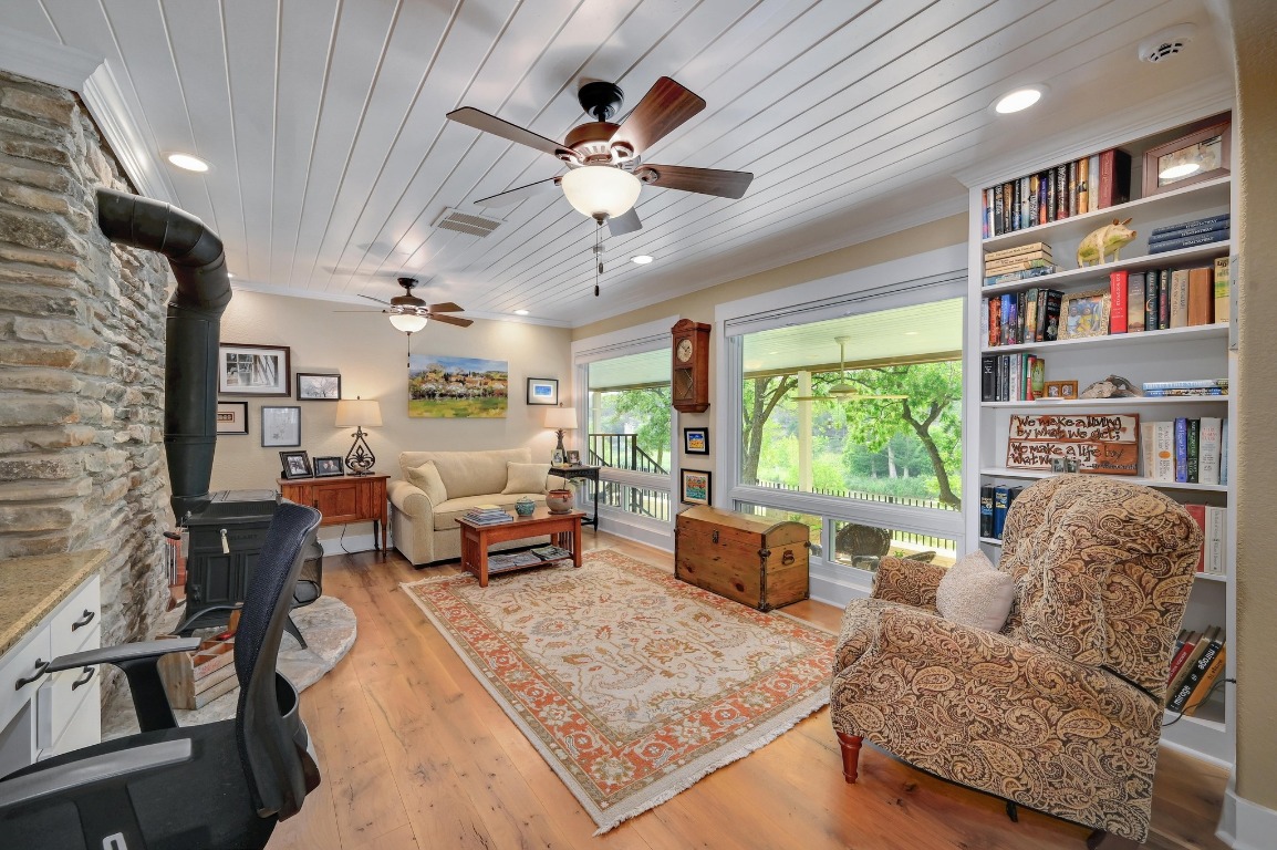 1020 River Road Wimberley, TX 78676 - Photo 21 of 40 a living room with furniture and a large window