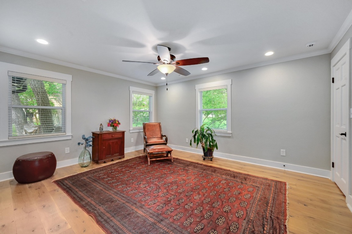 1020 River Road Wimberley, TX 78676 - Photo 28 of 40 a living room with furniture and a large window