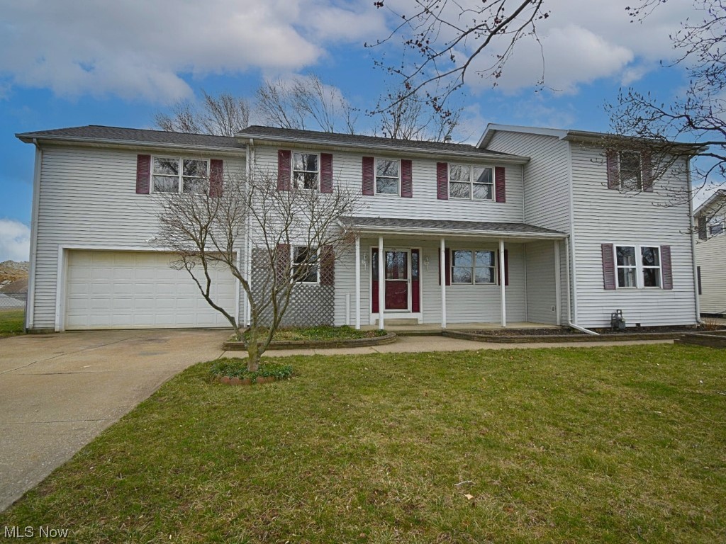 2608 Narrows Road Painesville, OH 44077 - Photo 1 of 1 View of front of property featuring a front yard and a garage