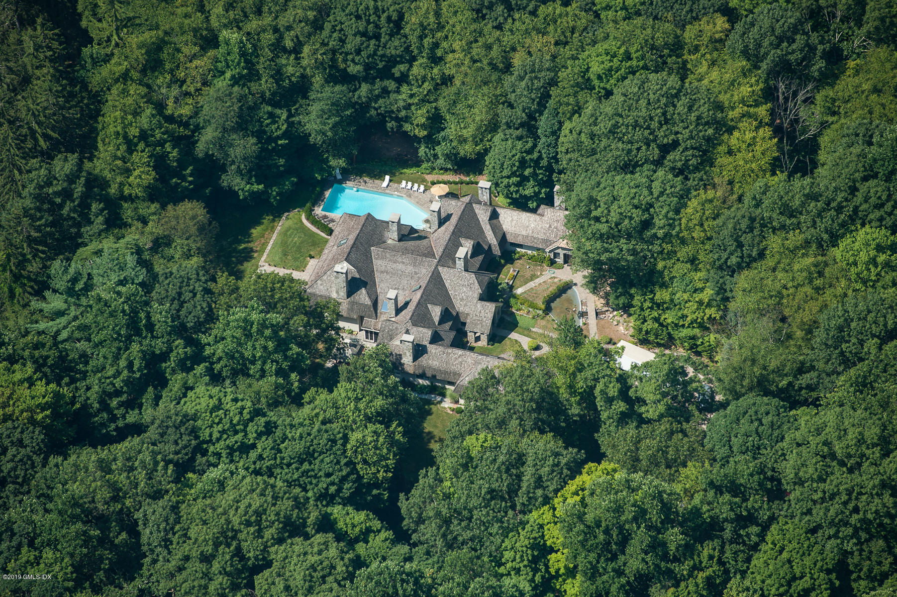 17 Heronvue Road Greenwich, CT 06831 - Photo 2 of 31 an aerial view of a house with yard and outdoor space