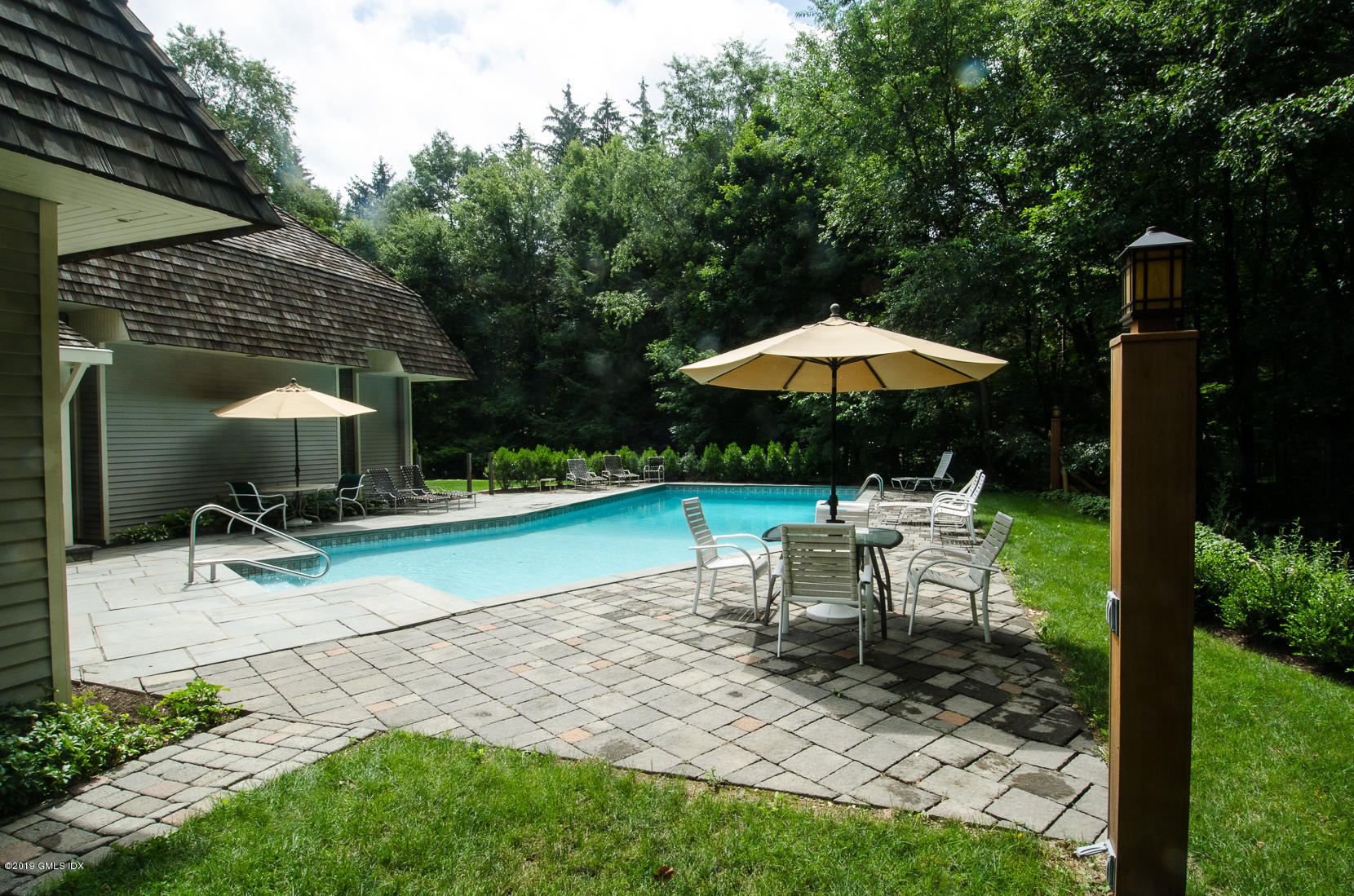 17 Heronvue Road Greenwich, CT 06831 - Photo 22 of 31 a view of a sitting area with furniture and backyard