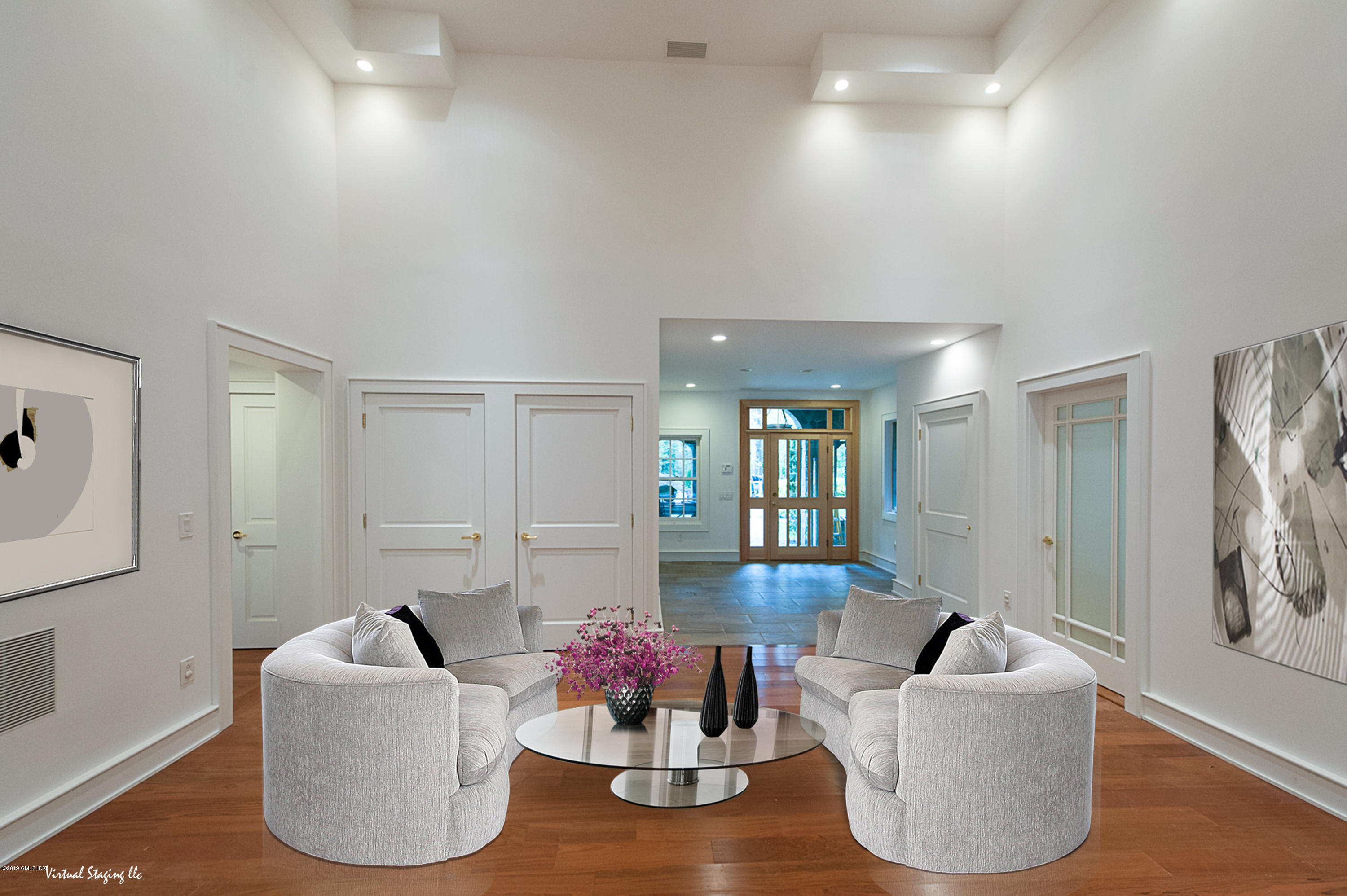 17 Heronvue Road Greenwich, CT 06831 - Photo 4 of 31 a living room with furniture and a mirror
