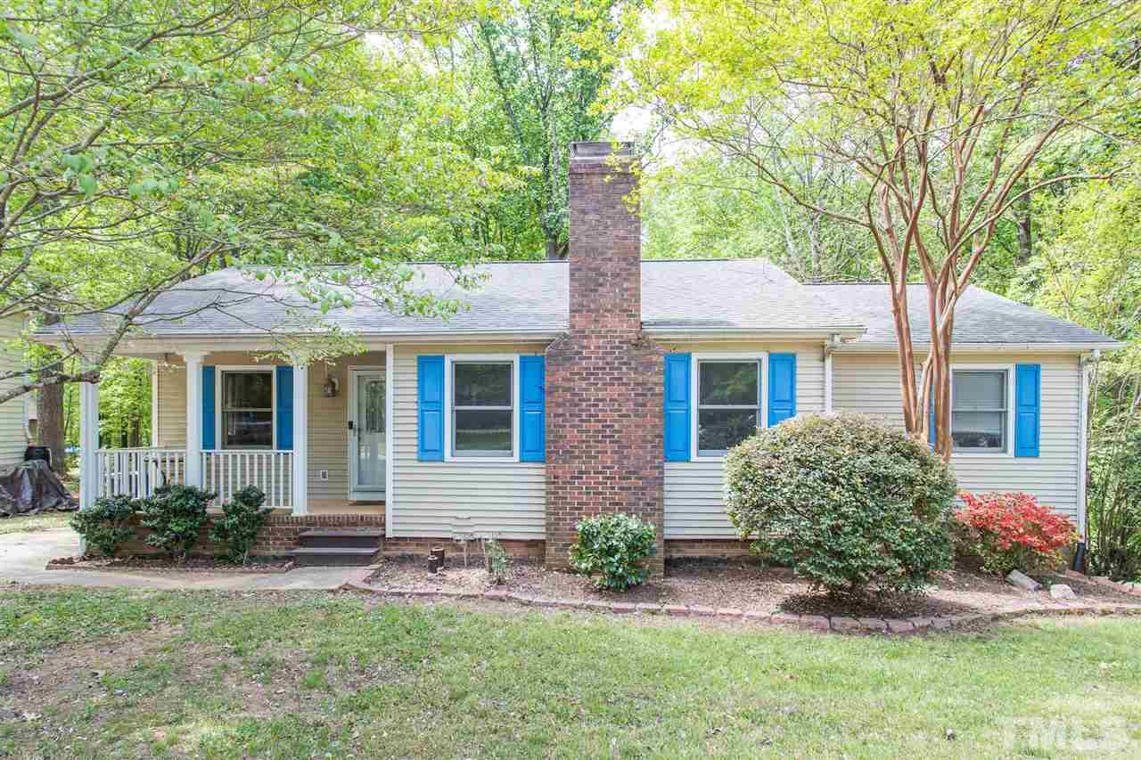 7535 Mine Valley Road Raleigh, NC 27615 - Photo 1 of 26 front view of a house with a yard
