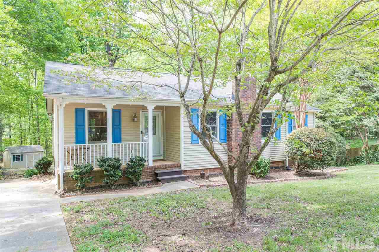 7535 Mine Valley Road Raleigh, NC 27615 - Photo 2 of 26 a view of a house with backyard and garden