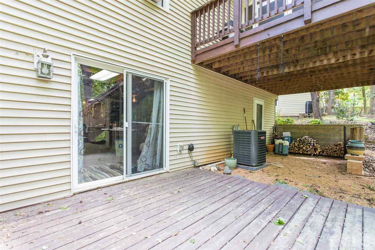 7535 Mine Valley Road Raleigh, NC 27615 - Photo 19 of 26 a view of a chairs on the deck