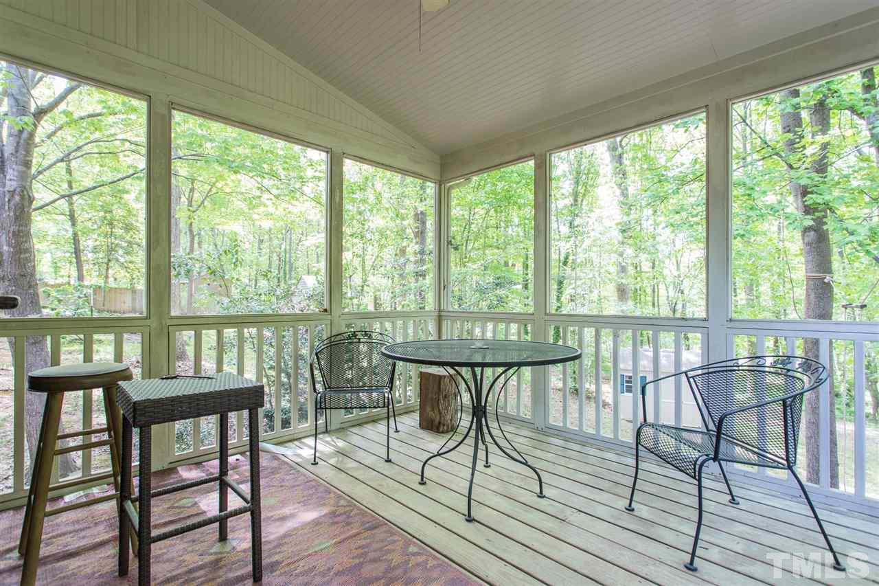 7535 Mine Valley Road Raleigh, NC 27615 - Photo 23 of 26 a view of a city from a balcony with furniture