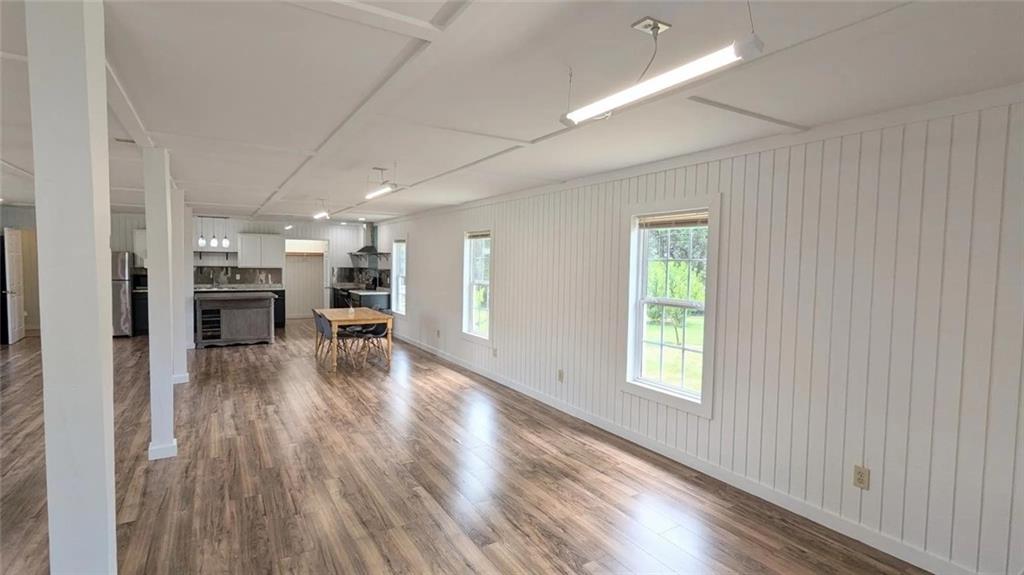 500 Coleman Mill Road Carrollton, GA 30116 - Photo 69 of 83 a view of a hallway with wooden floor and a window