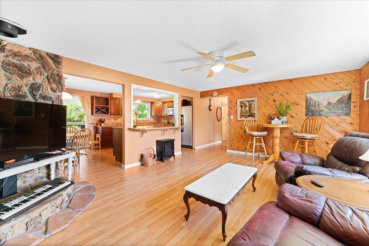 4093 Old Upton Road Central Point, OR 97502 - Photo 7 of 23 a living room with furniture and a flat screen tv