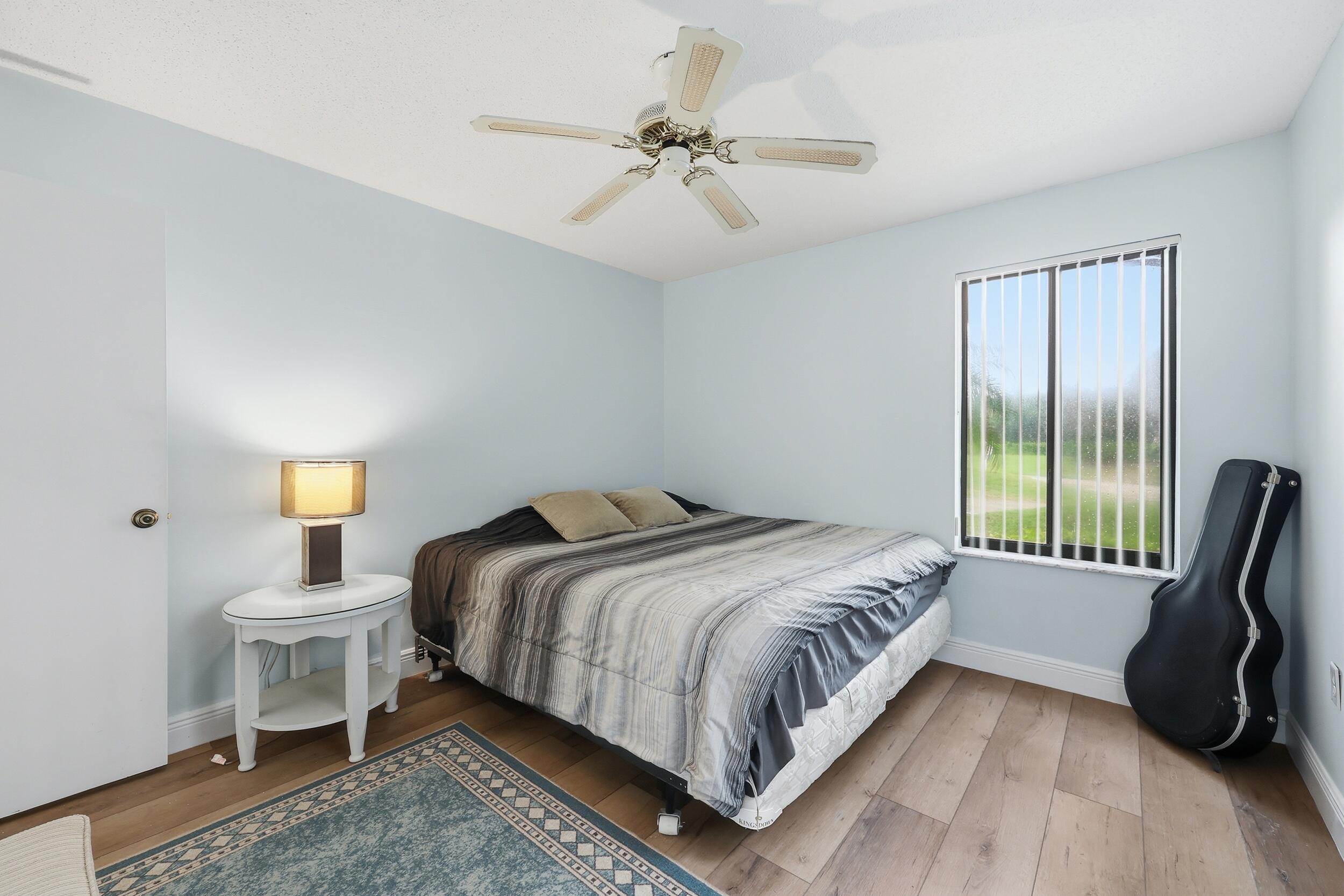 5111 Southeast Miles Grant Road, Unit 102 Stuart, FL 34997 - Photo 20 of 30 2nd bedroom