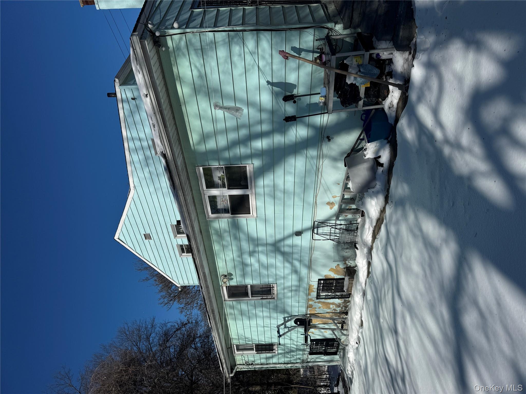 138 West Kingsbridge Road Mount Vernon, NY 10550 - Photo 2 of 6 a view of a house with patio