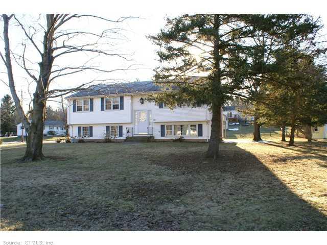 763 Laurel Grove Road Middletown, CT 06457 - Photo 1 of 1 a view of a house with a yard