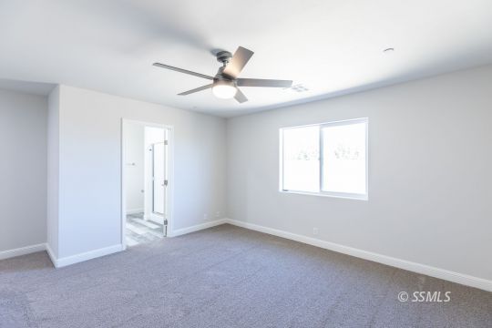 1012 Sims Street Ridgecrest, CA 93555 - Photo 27 of 36 a view of an empty room with a window