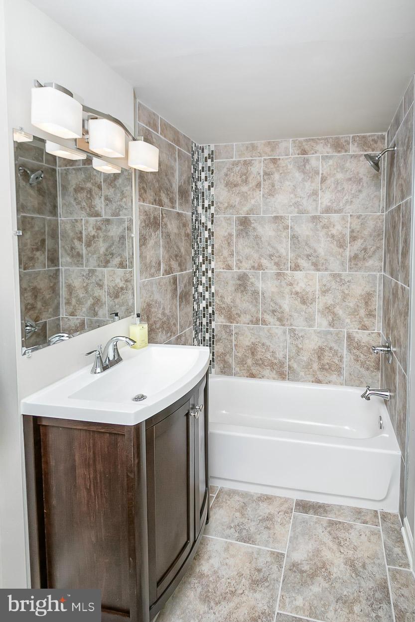 4 Dunmore Road Baltimore, MD 21228 - Photo 16 of 24 Remodeled Bath with Custom Accent Tile