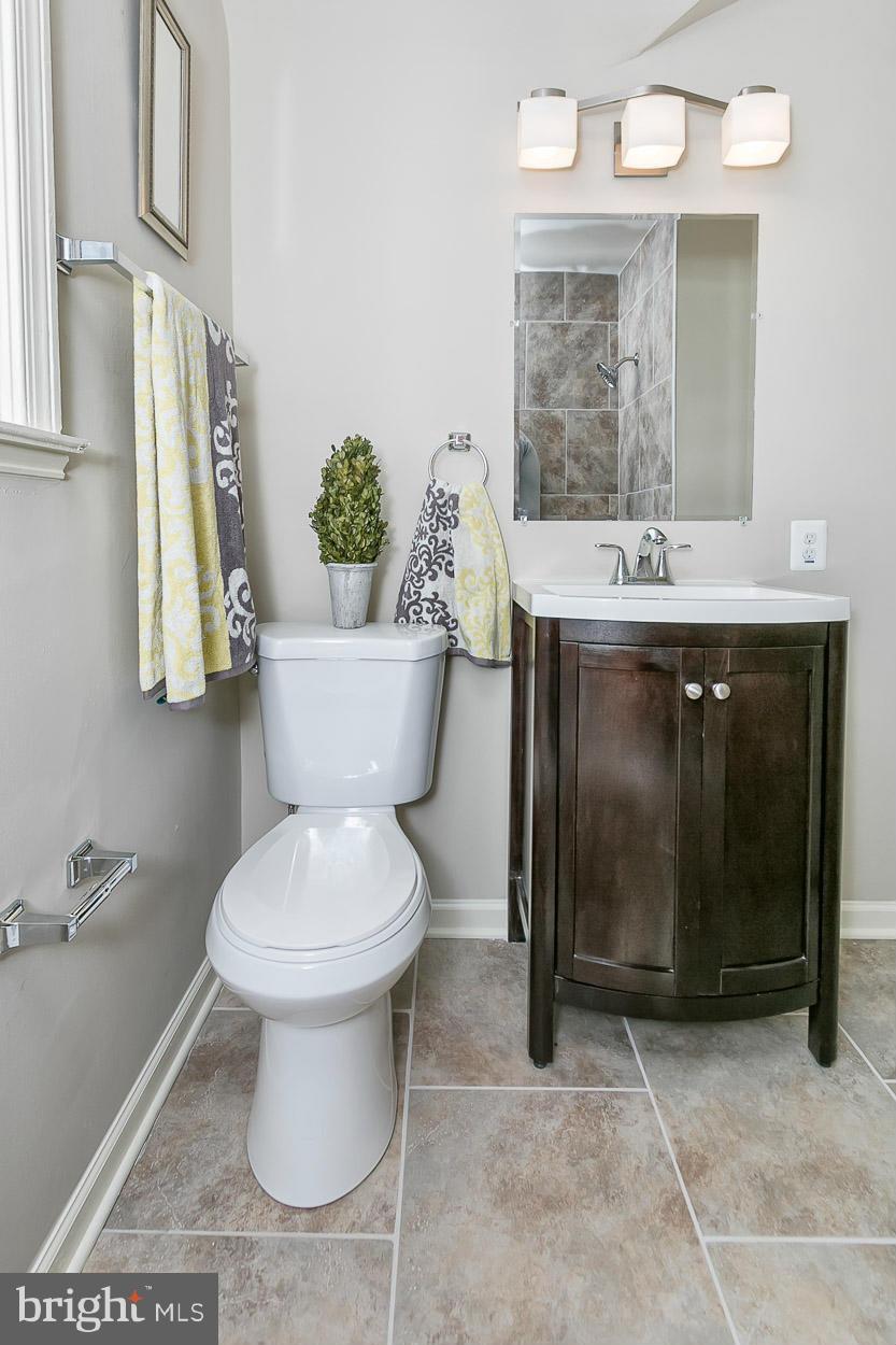 4 Dunmore Road Baltimore, MD 21228 - Photo 20 of 24 Baths with Ceramic Tile and Modern Vanities