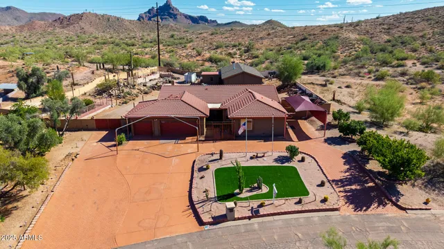 an aerial view of a house with a garden