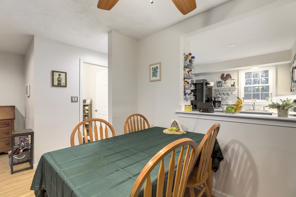 585 Turnpike Street, Unit 2 Easton, MA 02375 - Photo 12 of 25 a view of a dining room with furniture and window