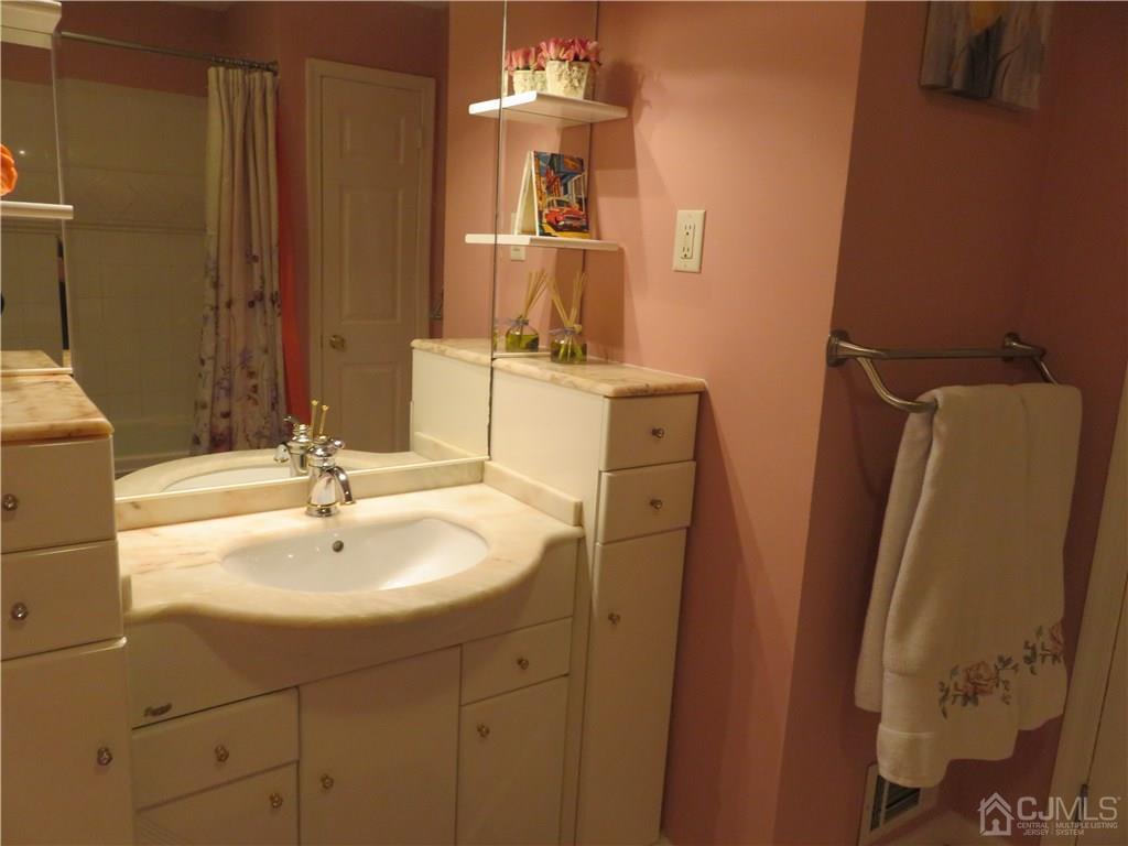 54 Fairfield Road Princeton, NJ 08540 - Photo 8 of 22 a bathroom with double vanity sink and two mirror