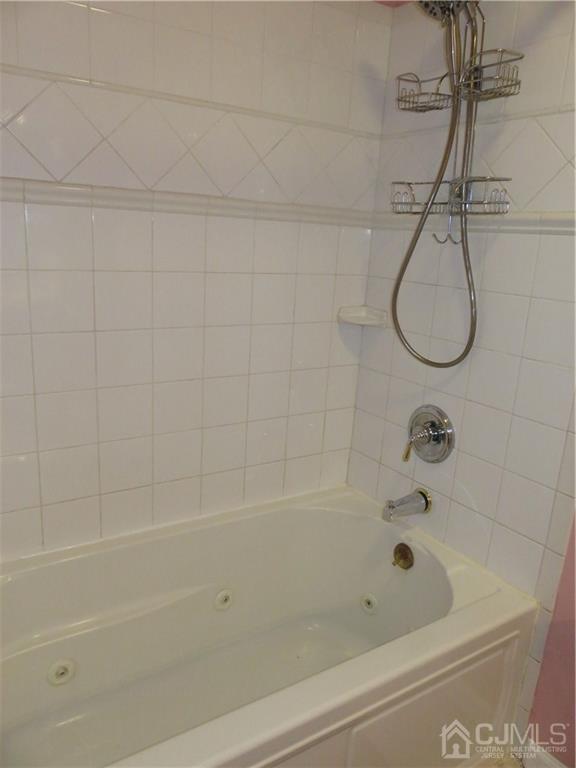 54 Fairfield Road Princeton, NJ 08540 - Photo 9 of 22 a bathroom with a bath tub with a shower