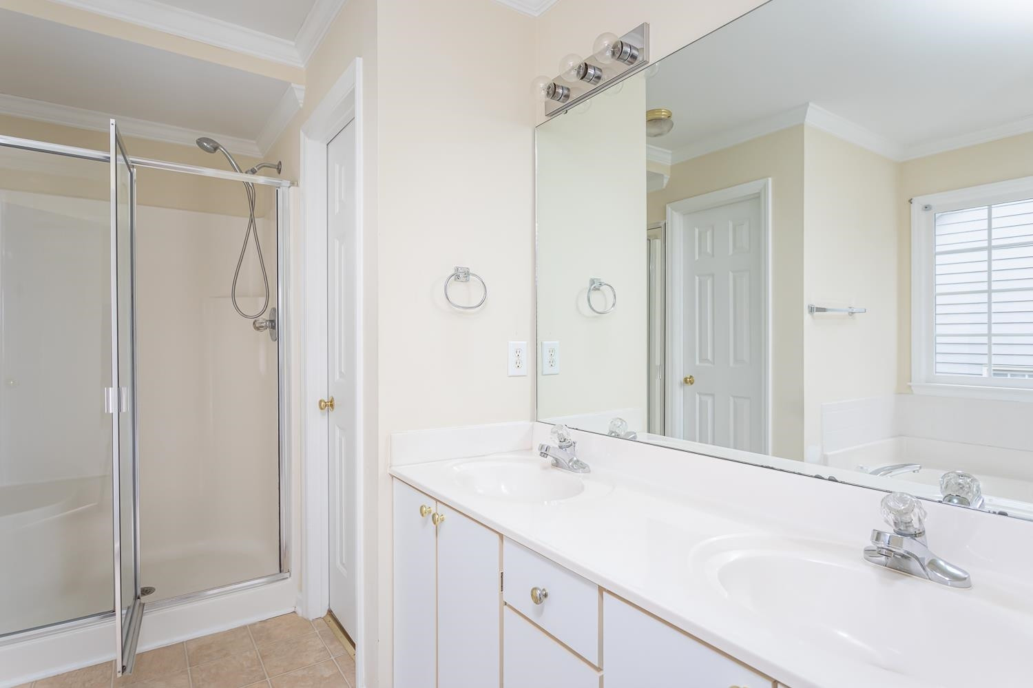 8669 Harps Mill Road Raleigh, NC 27615 - Photo 7 of 13 Everything you need in the owner's bath: dual vanity, large WALK-IN SHOWER, water closet, GARDEN TUB and a spacious WALK-IN CLOSET! Owners Bath
