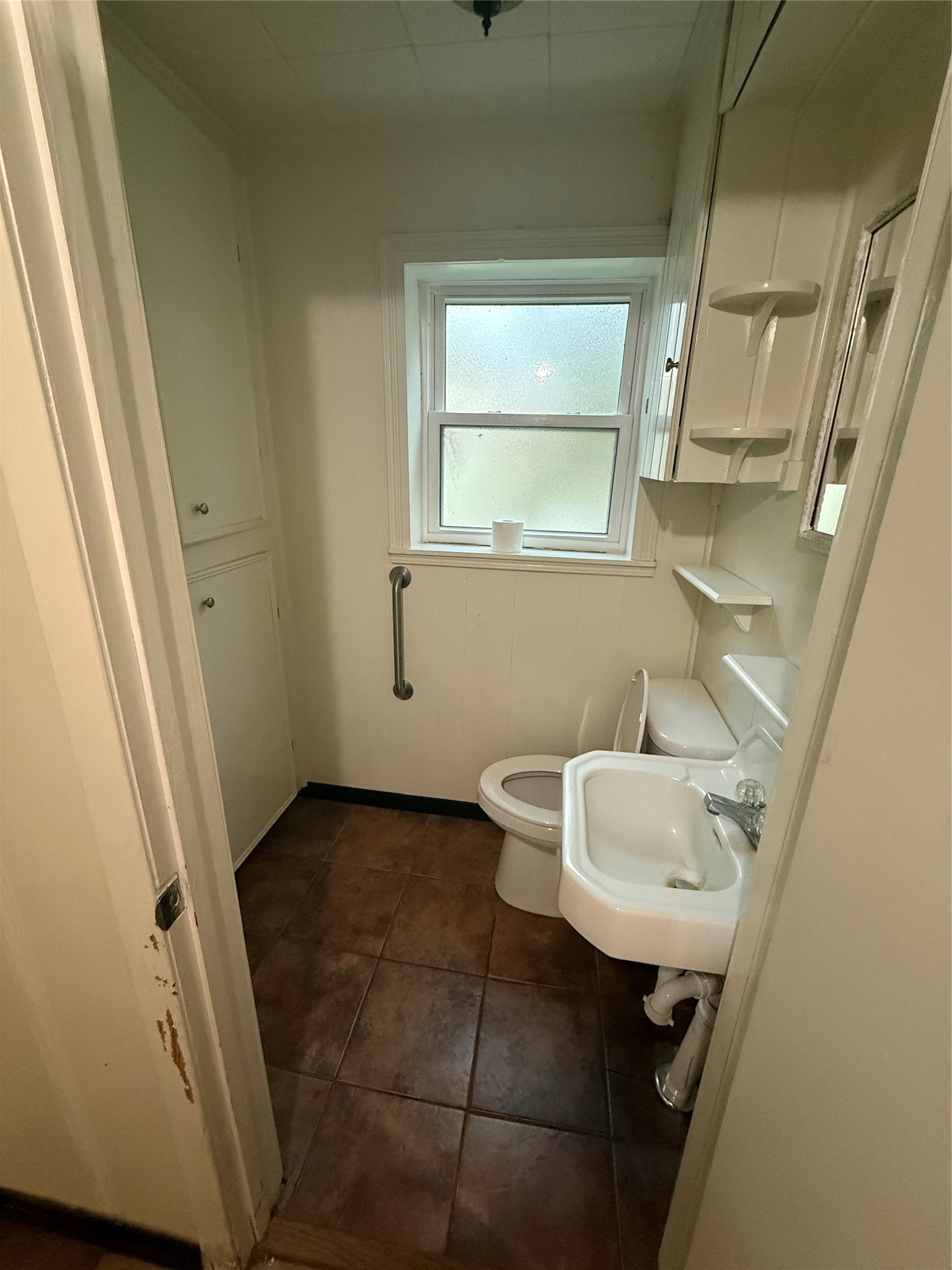 795 Highway 393 Loop Goodrich, TX 77335 - Photo 13 of 22 a bathroom with a sink toilet and mirror