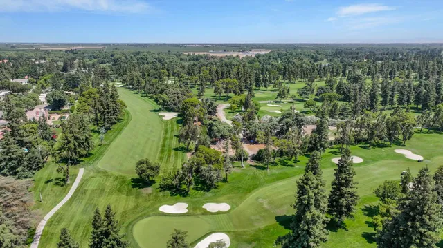 a view of a lake with green space