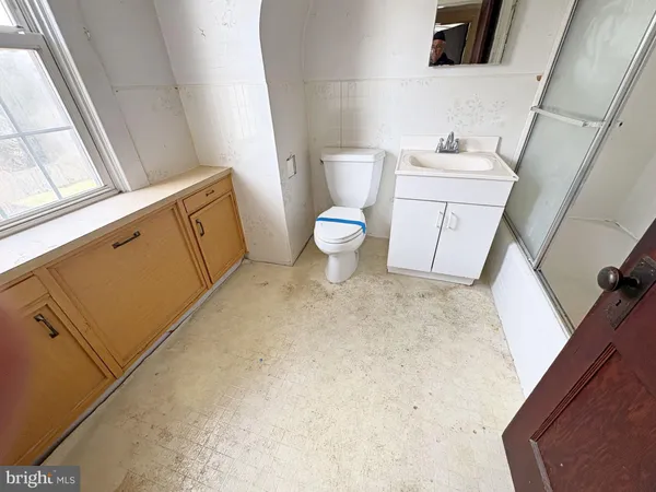 a bathroom with a sink and a toilet