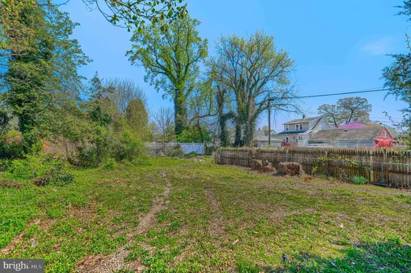 a view of backyard with green space