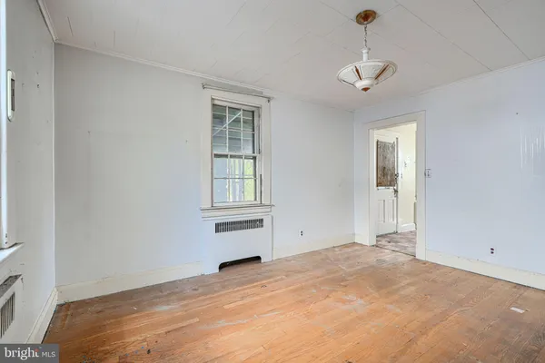 a view of empty room with windows